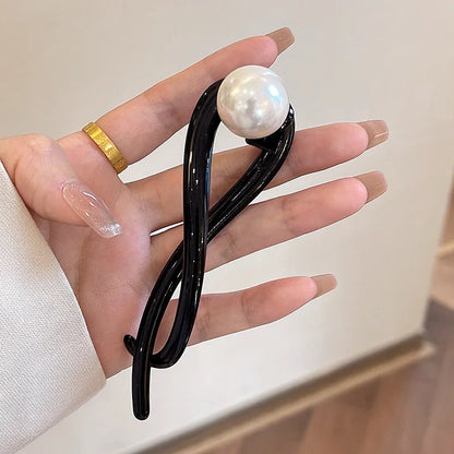 Elegante luxe haarclip met decoratieve bol