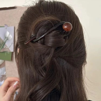 Elegante luxe haarclip met decoratieve bol